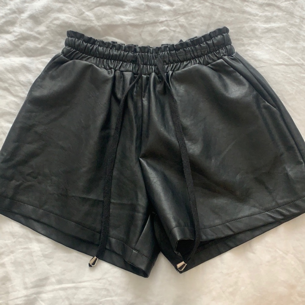 Black leather shorts